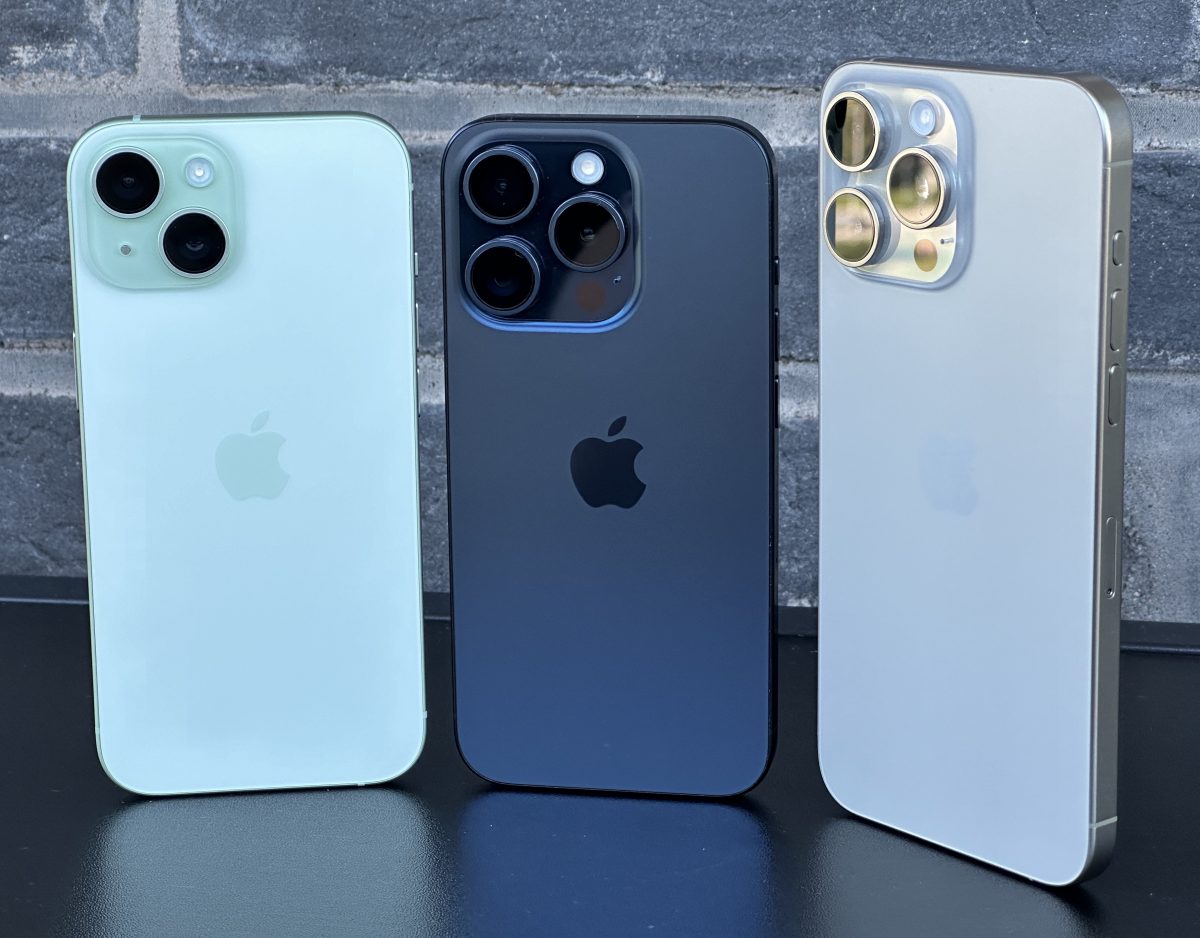 Kuvassa iPhone 15, iPhone 15 Pro ja iPhone 15 Pro Max.